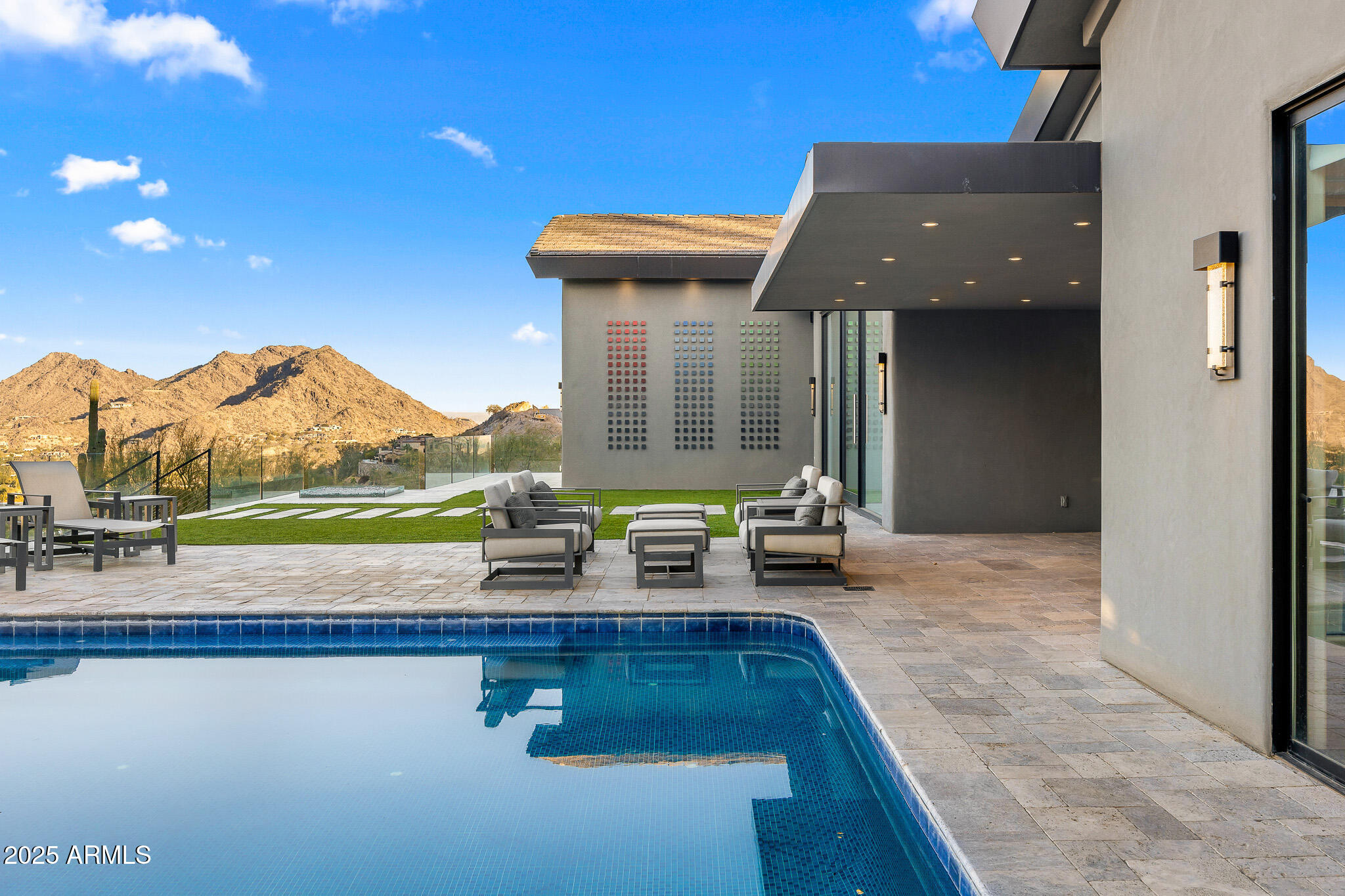 4129 East Sandy Mountain Road Paradise Valley, AZ 85253 - Photo 56 of 76 a view of swimming pool with outdoor seating and a patio