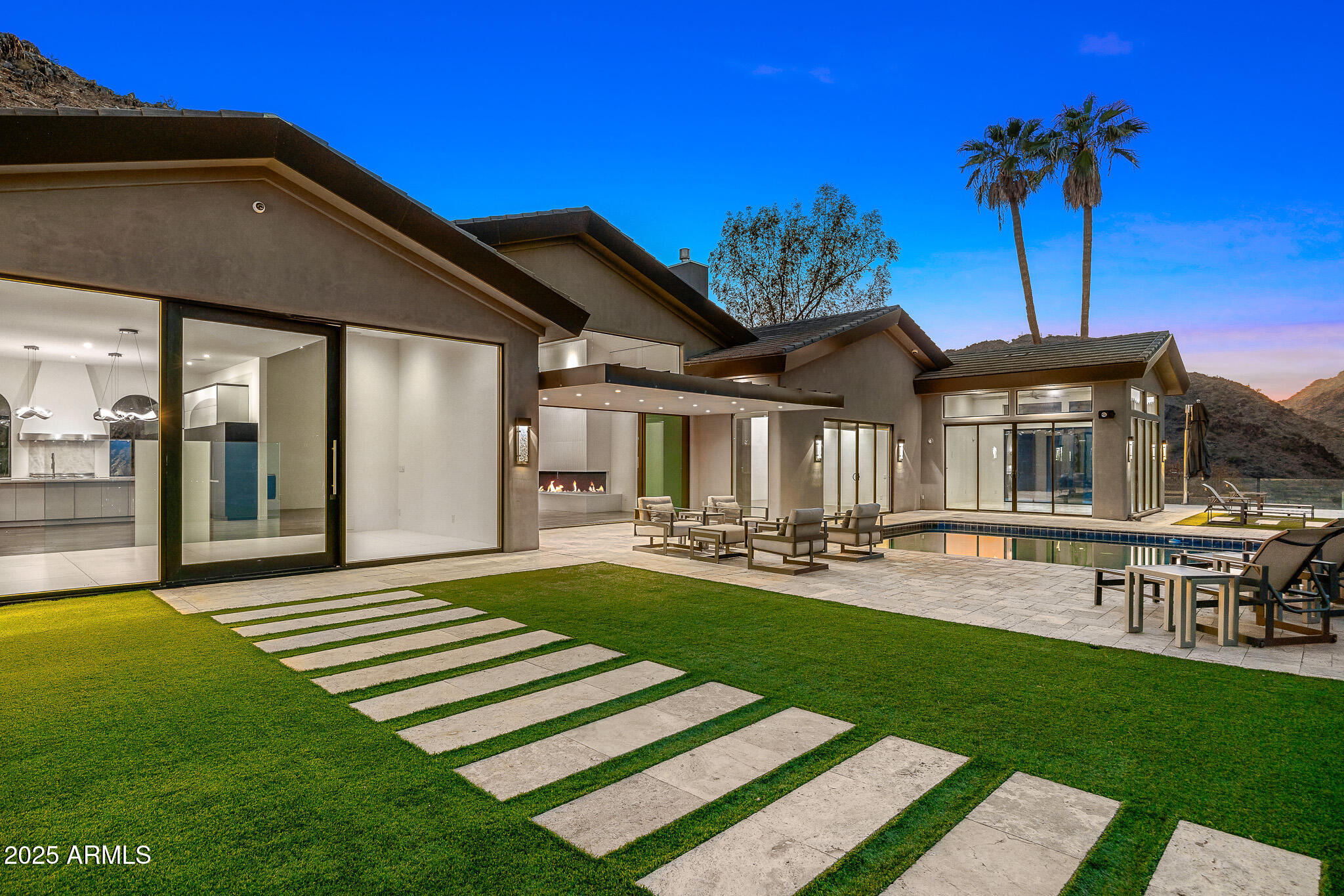 4129 East Sandy Mountain Road Paradise Valley, AZ 85253 - Photo 62 of 76 a view of a house with a yard porch and sitting area