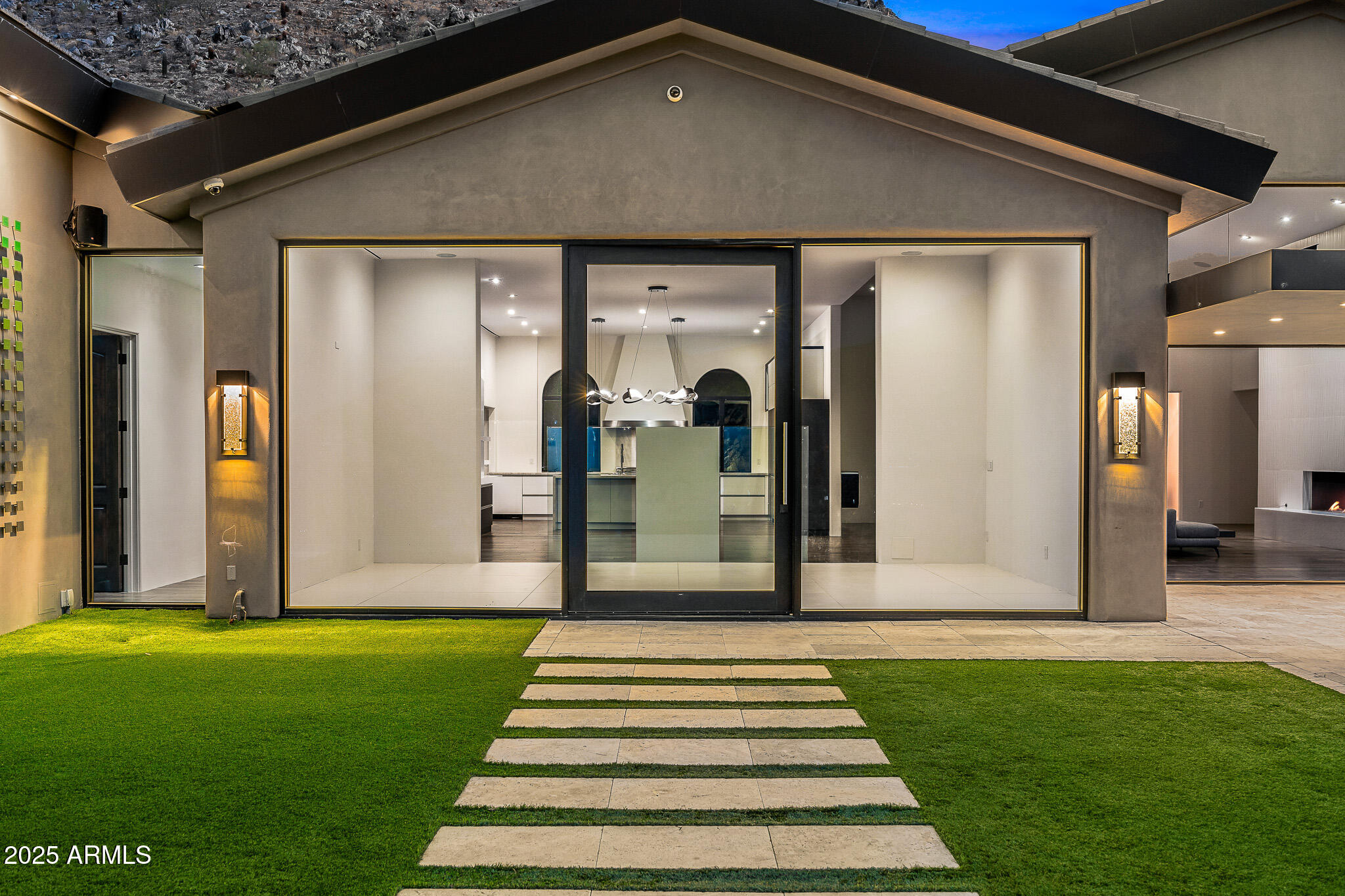 4129 East Sandy Mountain Road Paradise Valley, AZ 85253 - Photo 63 of 76 a front view of a house with a garden