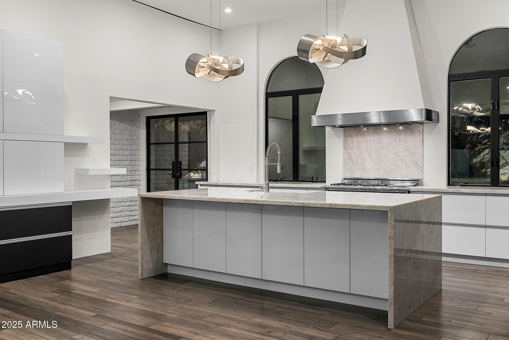 4129 East Sandy Mountain Road Paradise Valley, AZ 85253 - Photo 64 of 76 a kitchen with a sink cabinets and window