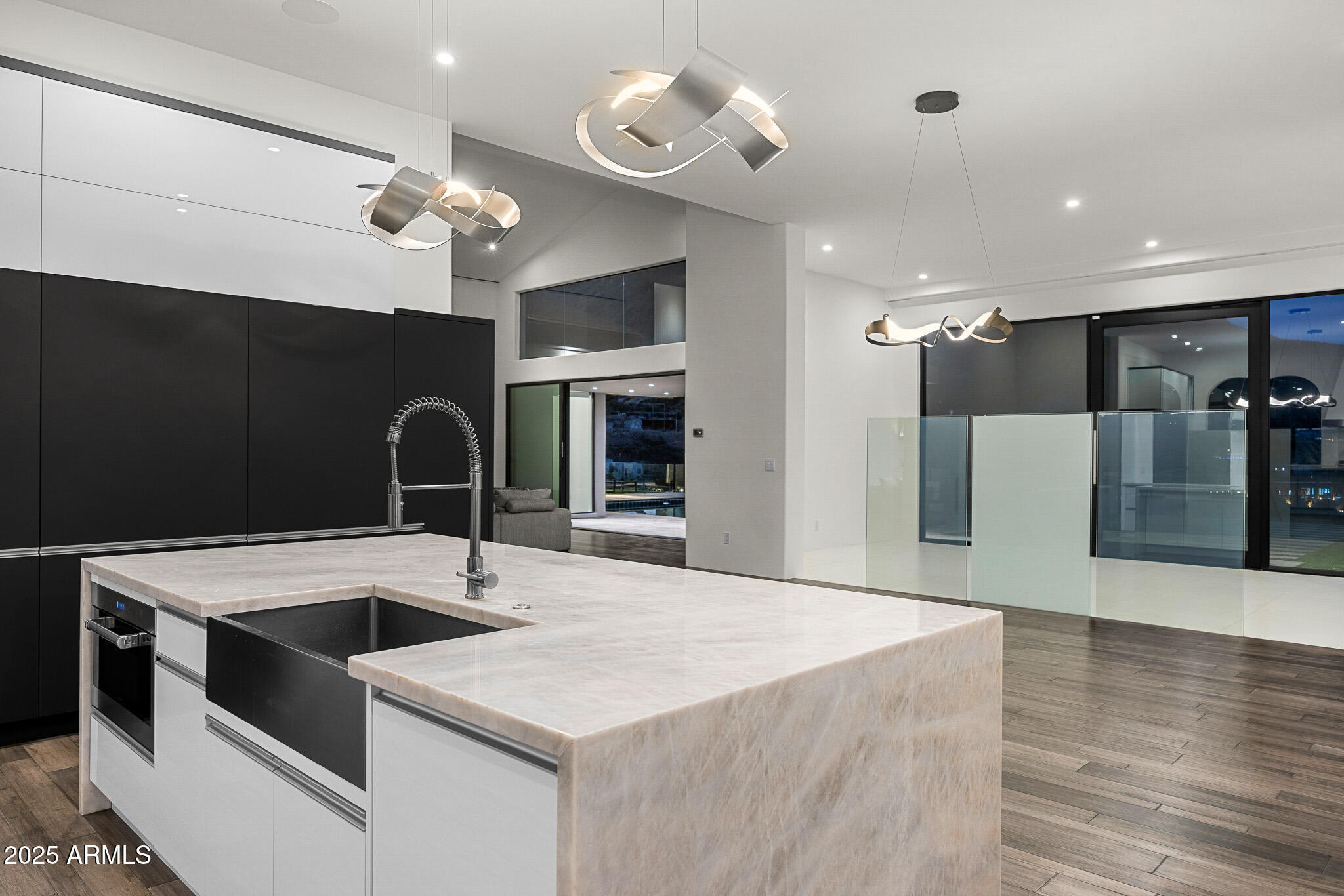 4129 East Sandy Mountain Road Paradise Valley, AZ 85253 - Photo 66 of 76 a kitchen with a stove a refrigerator and a fireplace with wooden floor