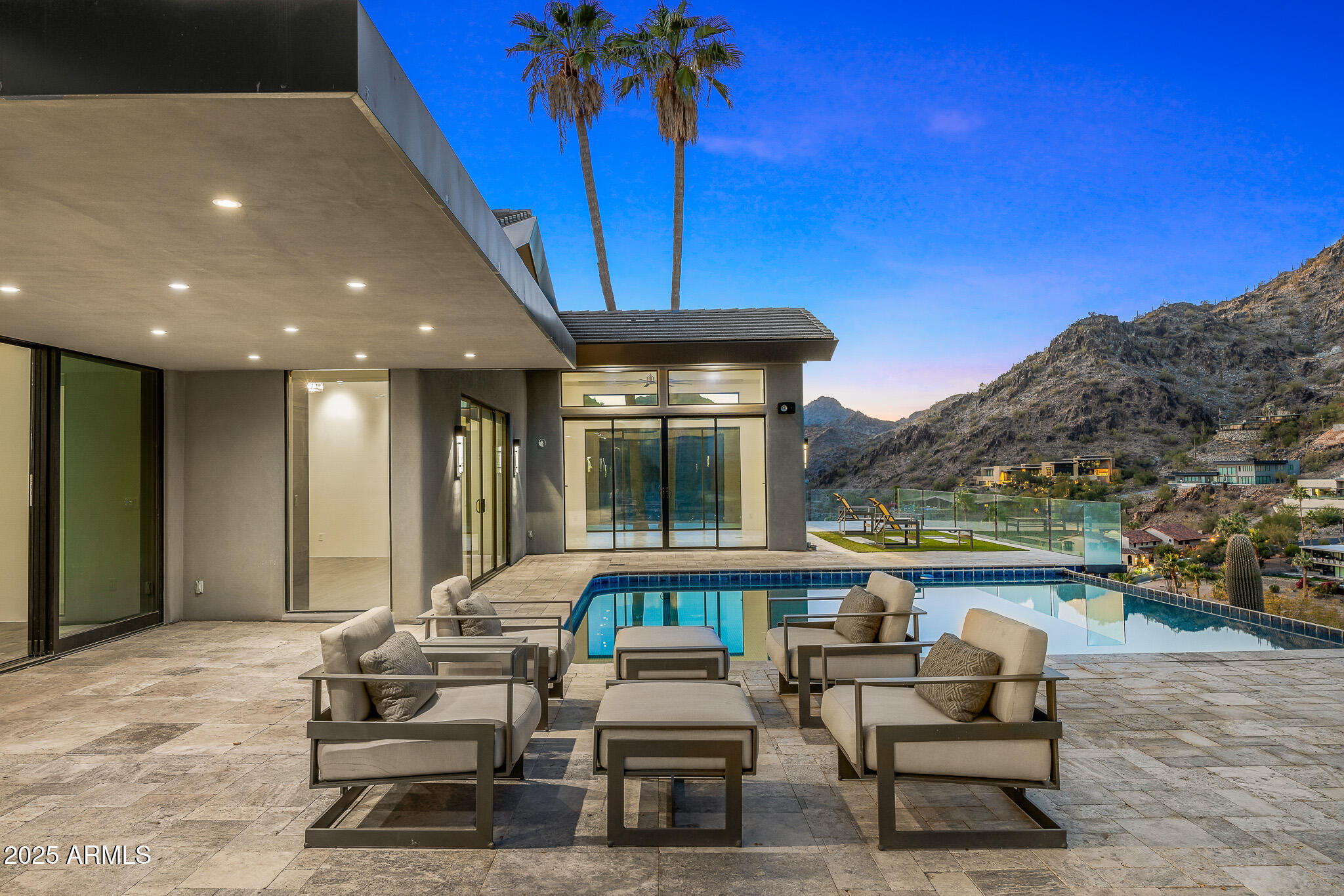 4129 East Sandy Mountain Road Paradise Valley, AZ 85253 - Photo 72 of 76 76pool deck and lounge_twilight