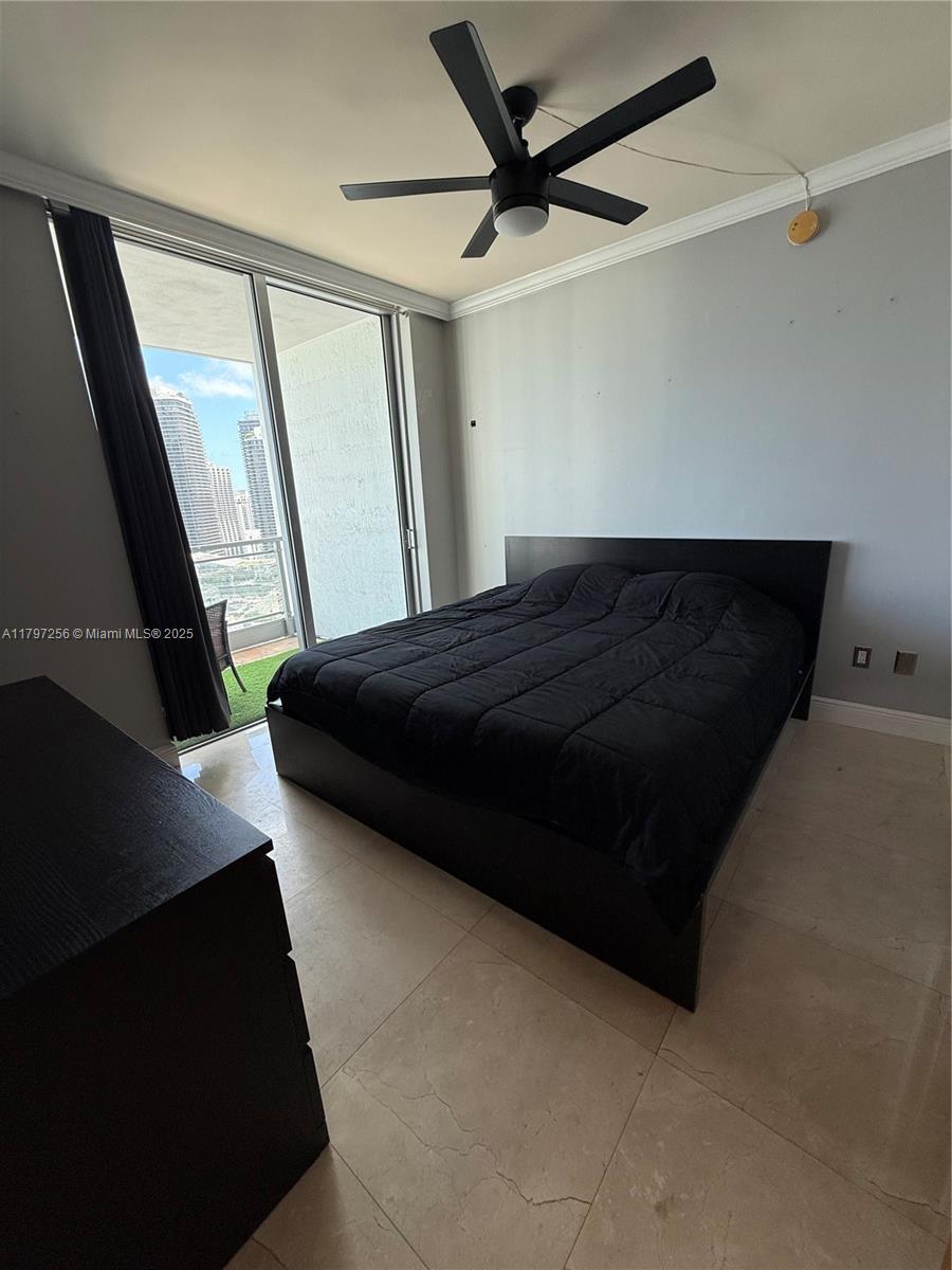90 Southwest 3rd Street, Unit 3601 Miami, FL 33130 - Photo 11 of 49 a bedroom with a bed and a window