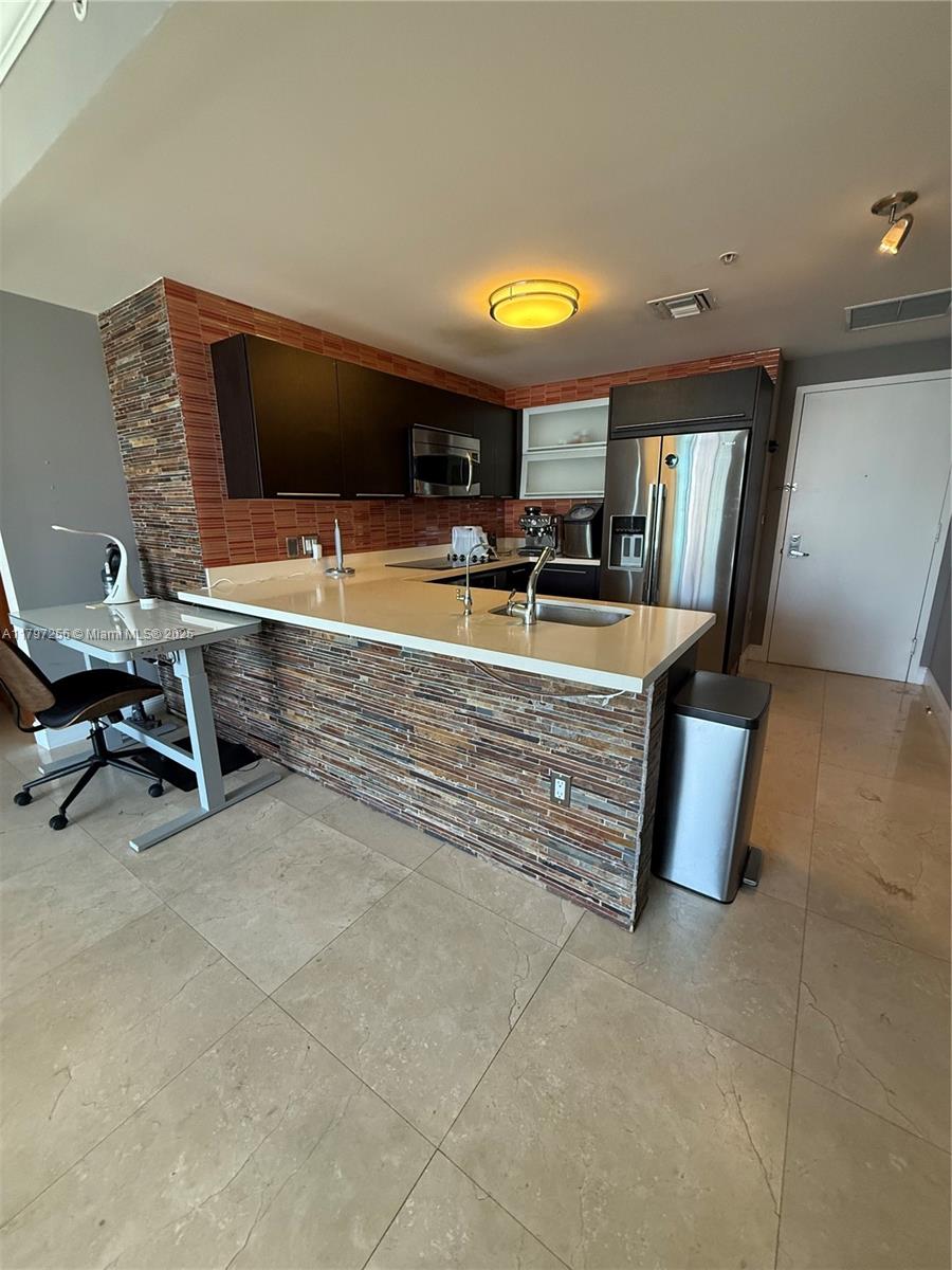 90 Southwest 3rd Street, Unit 3601 Miami, FL 33130 - Photo 15 of 49 a view of a living room and dining room