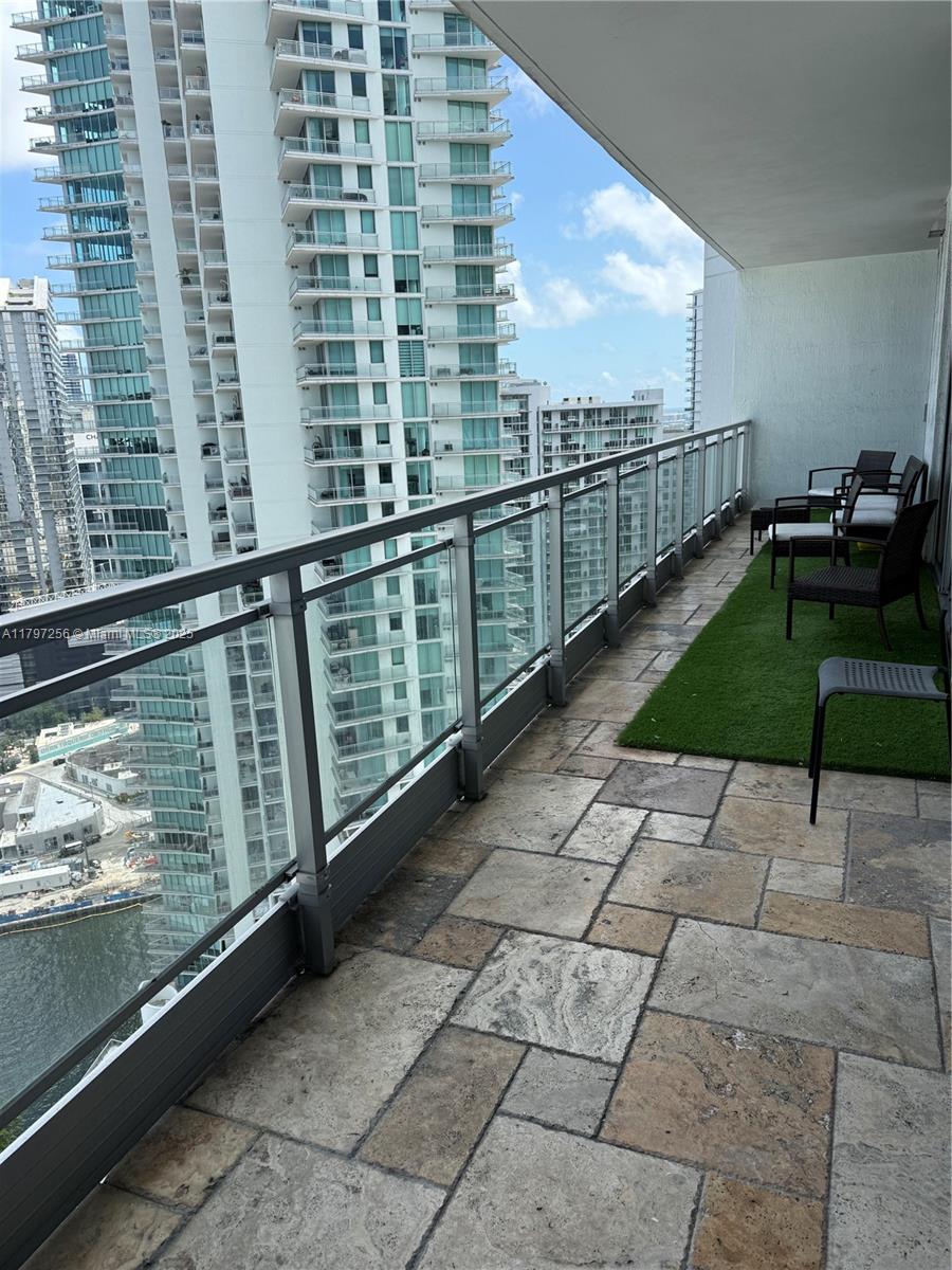 90 Southwest 3rd Street, Unit 3601 Miami, FL 33130 - Photo 21 of 49 a view of balcony with wooden floor