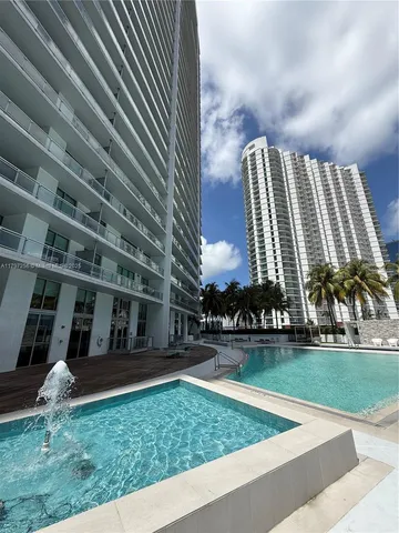 a view of building with yard