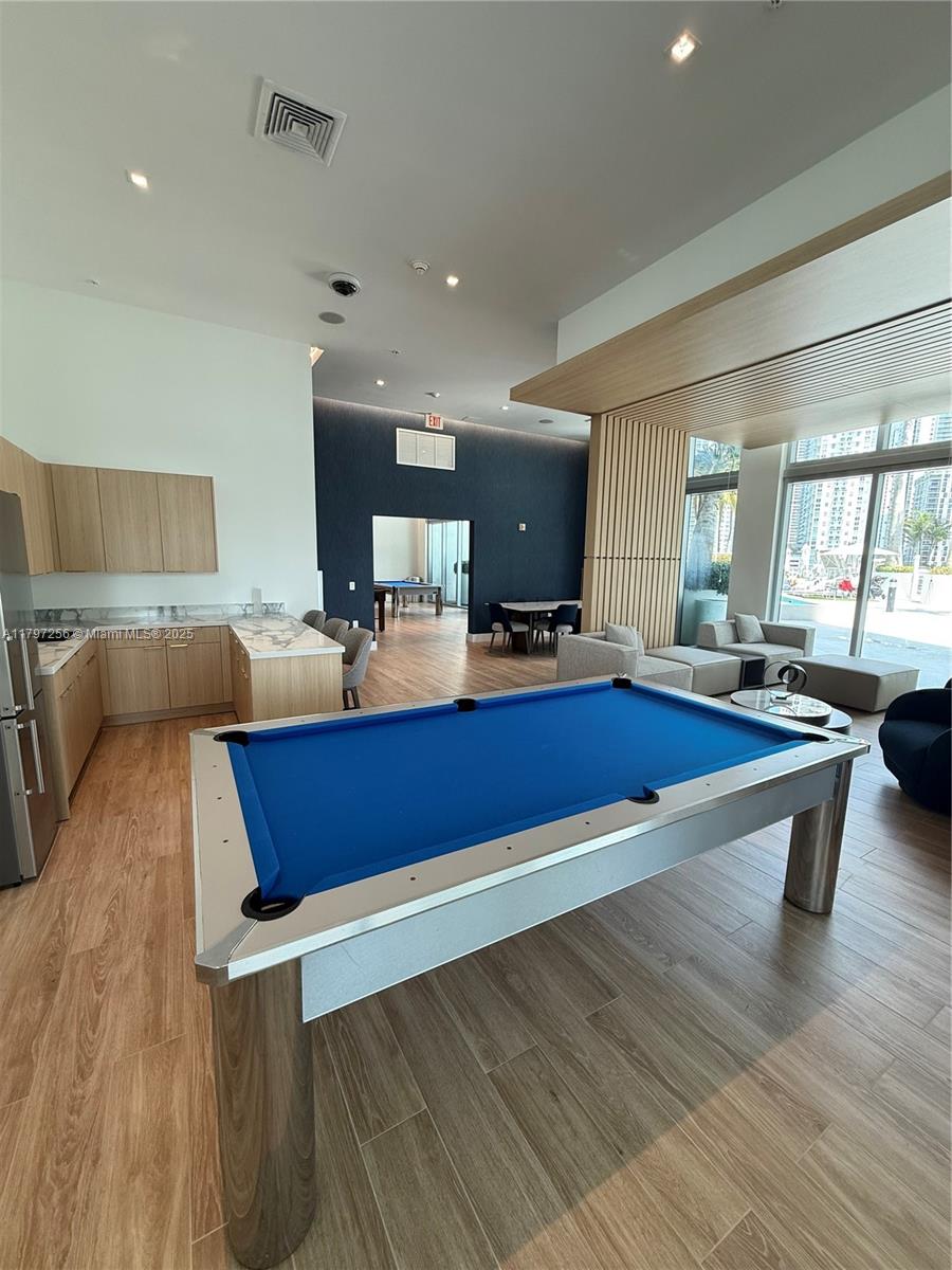 90 Southwest 3rd Street, Unit 3601 Miami, FL 33130 - Photo 37 of 49 a living room with wooden floor and furniture