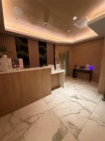 a view of a livingroom with furniture