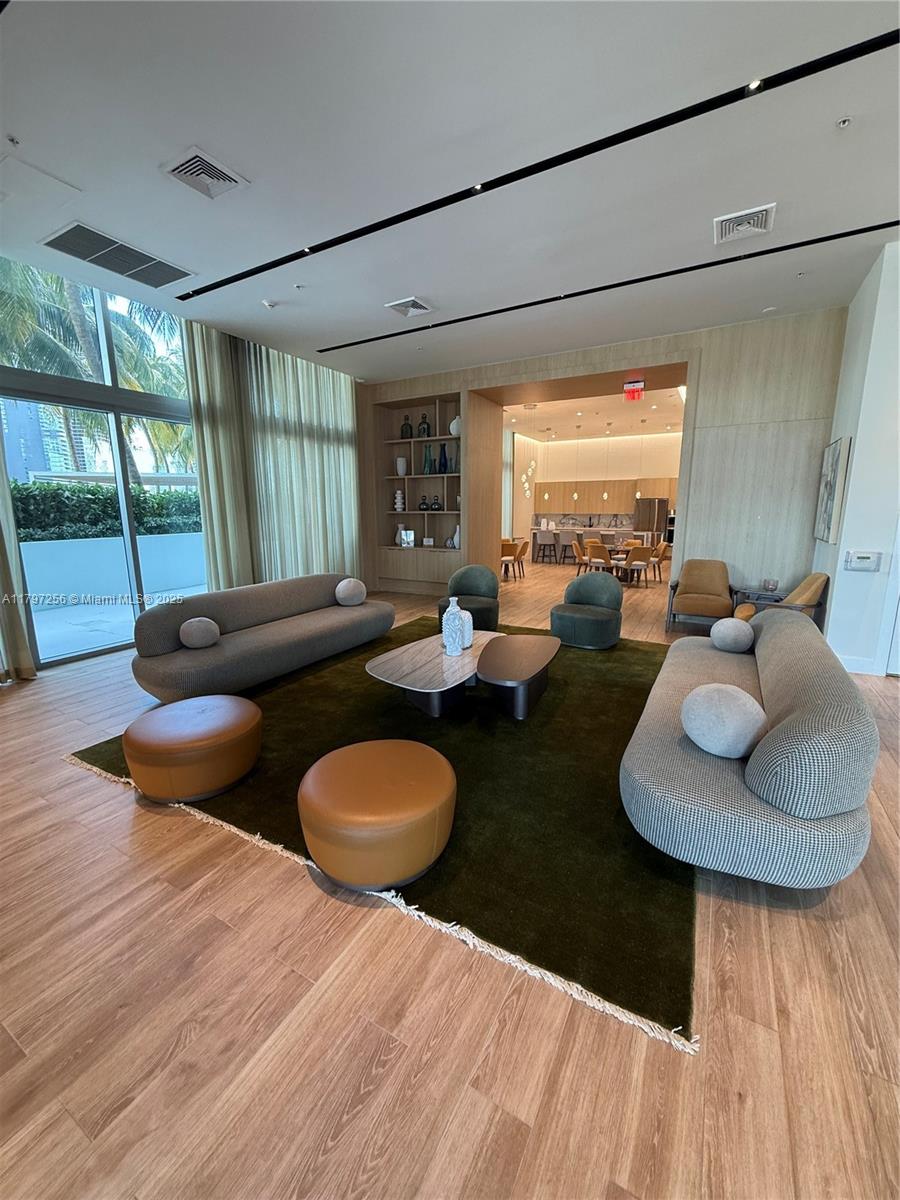 90 Southwest 3rd Street, Unit 3601 Miami, FL 33130 - Photo 47 of 49 a living room with furniture and a large window