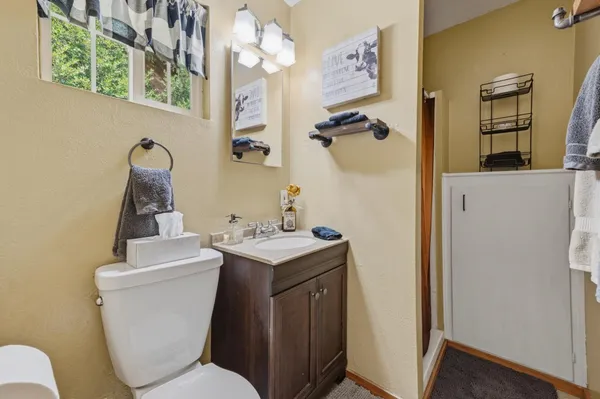 a view of a door and chair in the room