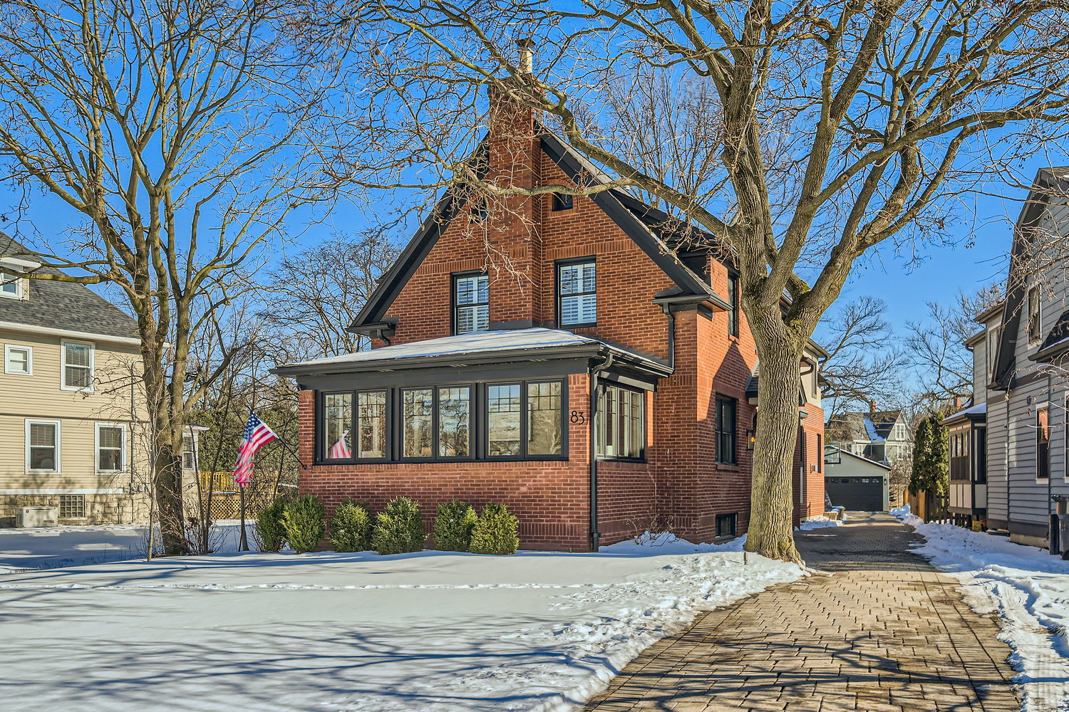 83 North Cowley Road Riverside, IL 60546 - Photo 1 of 36 a front view of a house with a yard