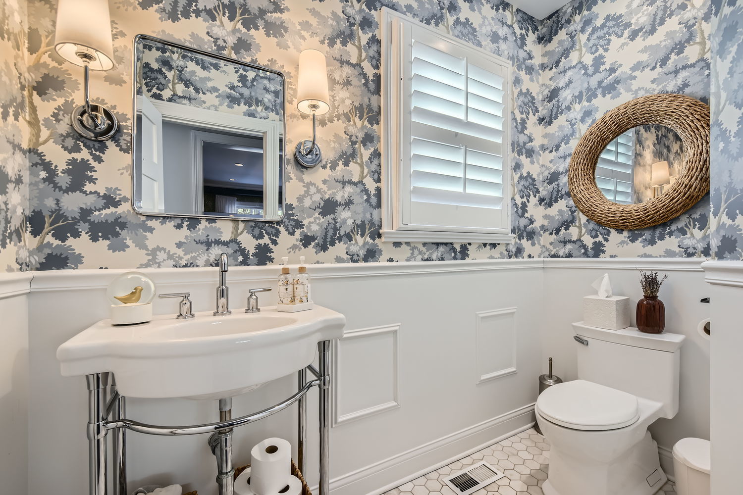 83 North Cowley Road Riverside, IL 60546 - Photo 14 of 36 a bathroom with a sink a toilet mirror and vanity