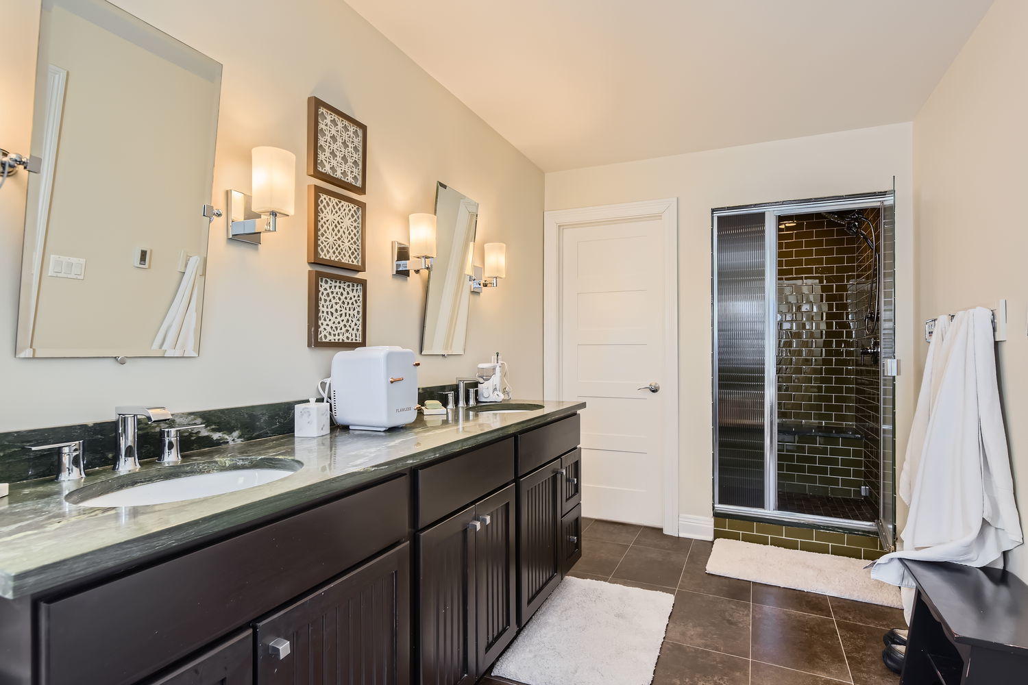 83 North Cowley Road Riverside, IL 60546 - Photo 18 of 36 a bathroom with a double vanity sink and a mirror