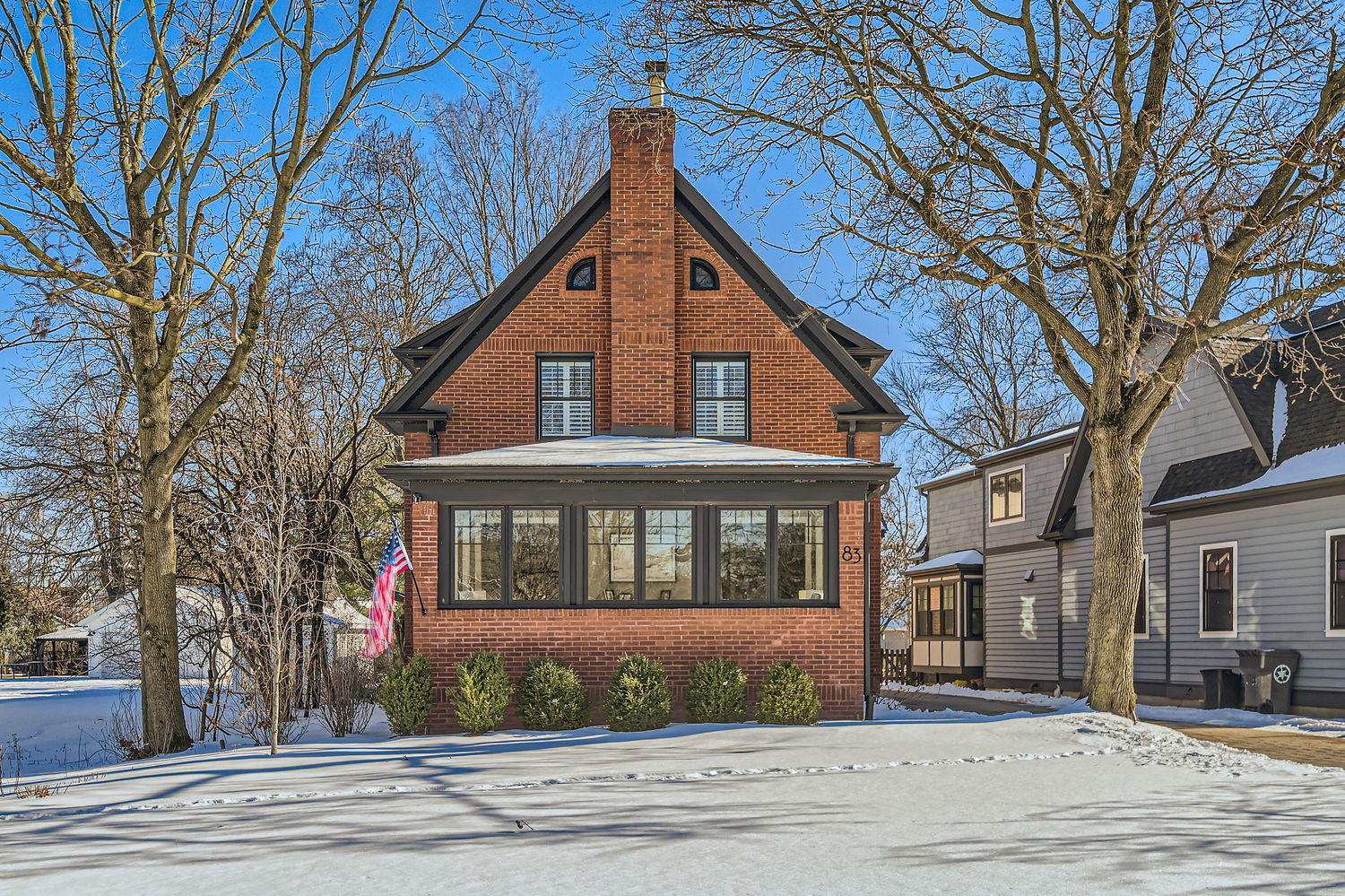 83 North Cowley Road Riverside, IL 60546 - Photo 2 of 36 a front view of a house with a yard