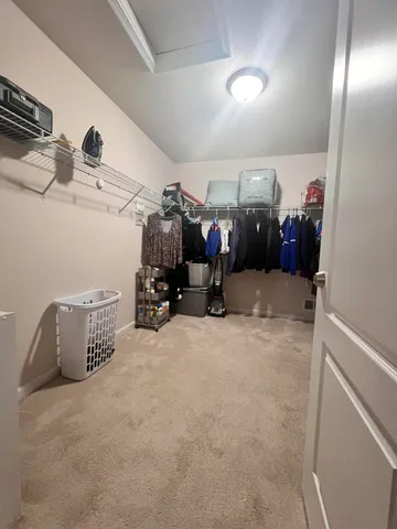 a view of a garage with storage