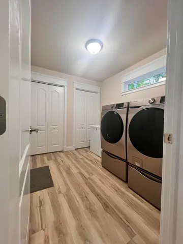 a bedroom with a bed and a ceiling fan