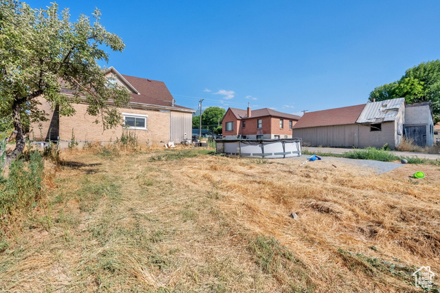 1632 South Main Street Springville, UT 84663 - Photo 74 of 93 View of yard featuring a covered pool