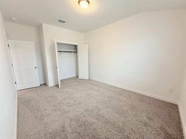 an empty room with a natural light