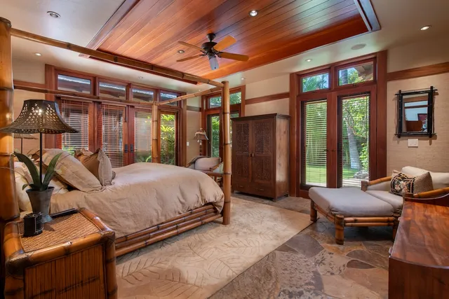 a bed room with a bed and a couch