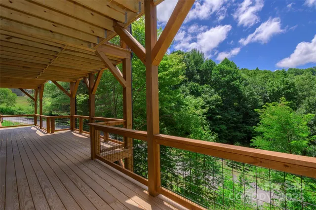 a view of a room with a ceiling fan