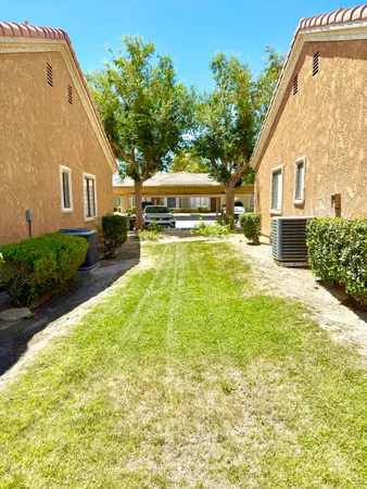 front view of a house with a big yard