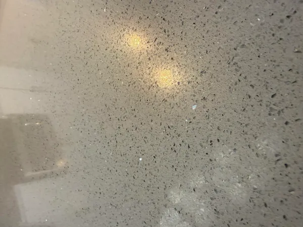 a kitchen with stainless steel appliances a sink a stove a microwave a counter top space and cabinets