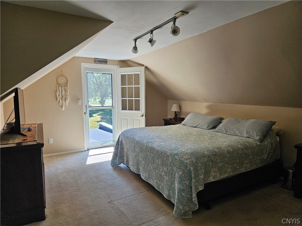211 Stonehedge Road Camillus, NY 13031 - Photo 12 of 20 HUGE 2nd floor main bedroom with door out to roof