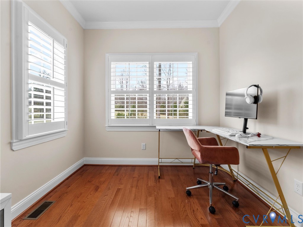 1555 Rocky Ford Road Powhatan, VA 23139 - Photo 30 of 80 a view of a workspace with furniture and a window