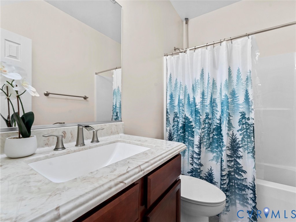 1555 Rocky Ford Road Powhatan, VA 23139 - Photo 40 of 80 Full guest bath located between bedroom 2 & bedroo