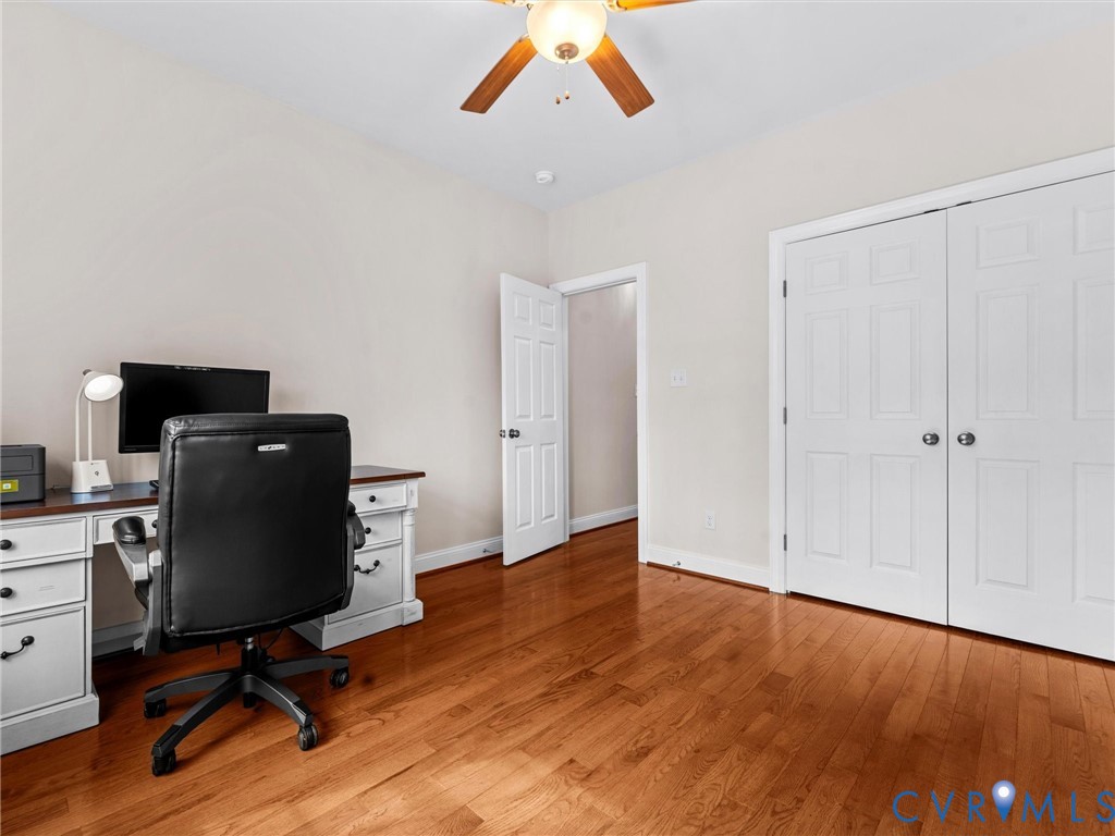 1555 Rocky Ford Road Powhatan, VA 23139 - Photo 42 of 80 a view of workspace with wooden floor and gym equipment