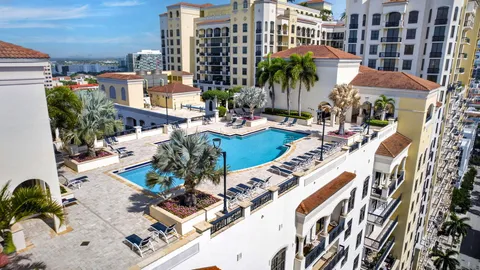 an aerial view of a house with swimming pool
