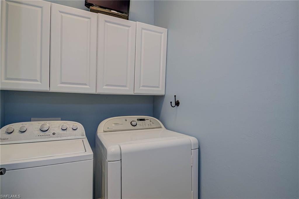 5761 Mayflower Way Ave Maria, FL 34142 - Photo 20 of 39 a utility room with dryer and washer
