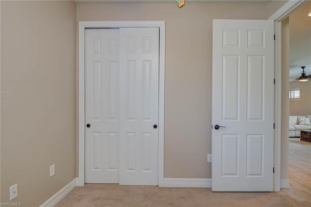 5761 Mayflower Way Ave Maria, FL 34142 - Photo 24 of 39 a view of an empty room