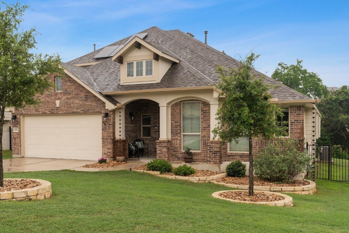 821 Mediterranean Drive Leander, TX 78641 - Photo 1 of 1 a front view of a house with a yard