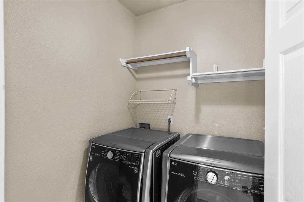 3901 Caney Creek Road Austin, TX 78732 - Photo 16 of 18 Laundry room is off of the breakfast dining. Washer and dryer are provided.