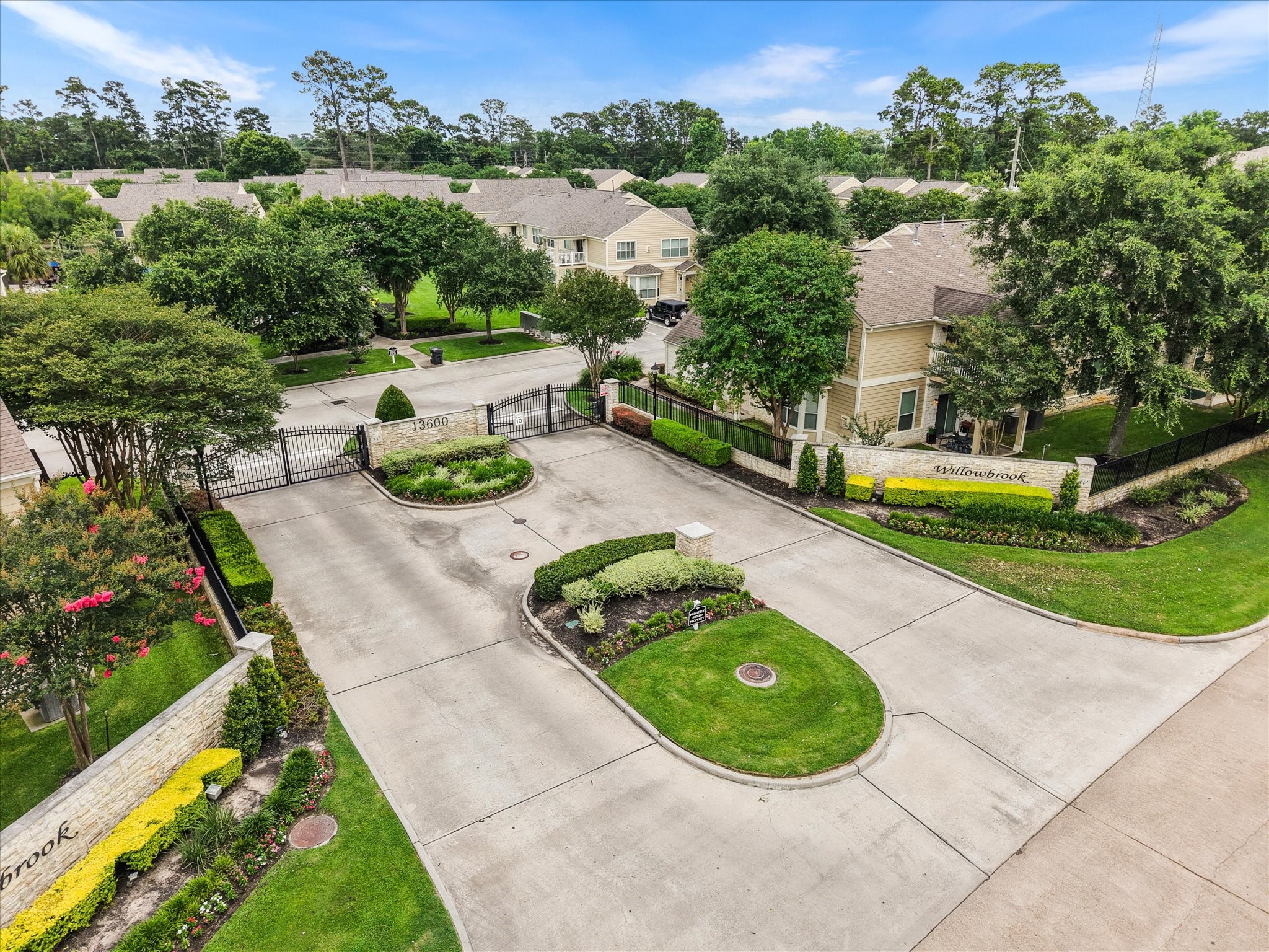 13600 Breton Ridge Street, Unit 31C Houston, TX 77070 - Photo 2 of 31 Arrive home each day through the private gated entrance, creating a sense of security and exclusivity while providing convenient access to shopping, dining, and major commuter routes.