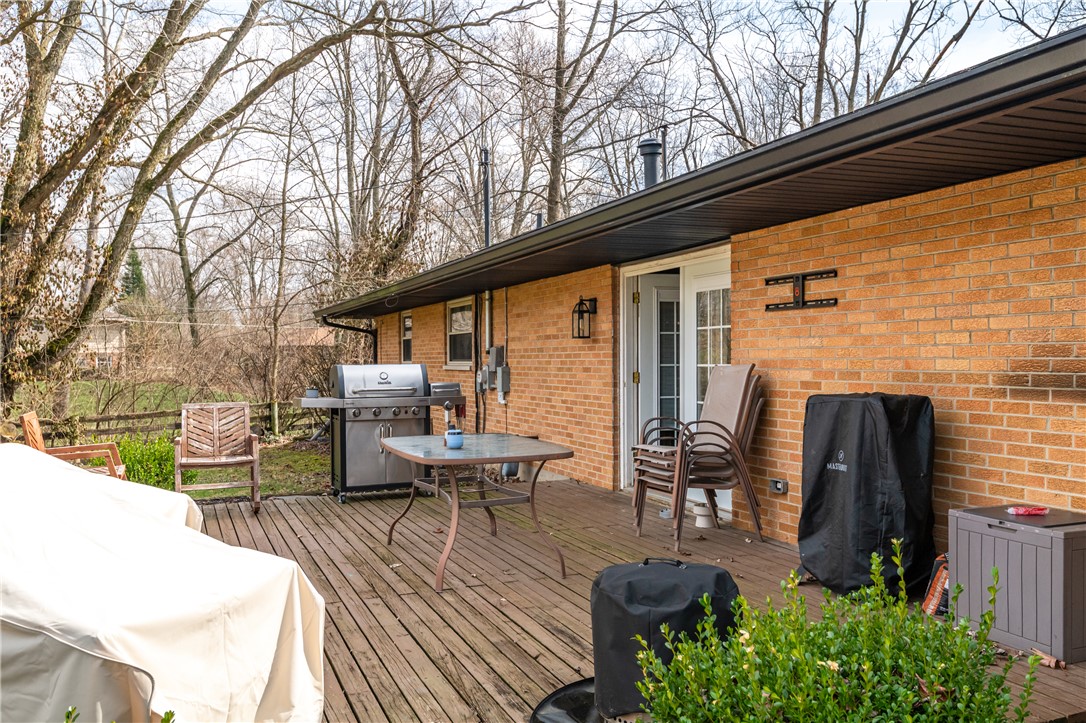 4102 Ridgetop Drive Bellbrook, OH 45305 - Photo 30 of 33 This spacious wooden deck offers abundant space for outdoor relaxation and entertaining.