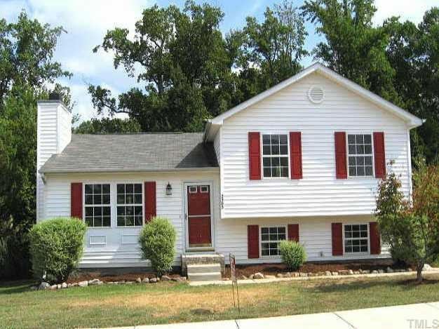 2305 Springhill Avenue Raleigh, NC 27603 - Photo 1 of 10 a view of a yard in front of house