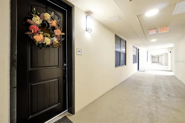 a view of a refrigerator in a kitchen