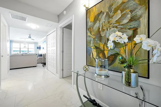 a view of a living room and a potted plant