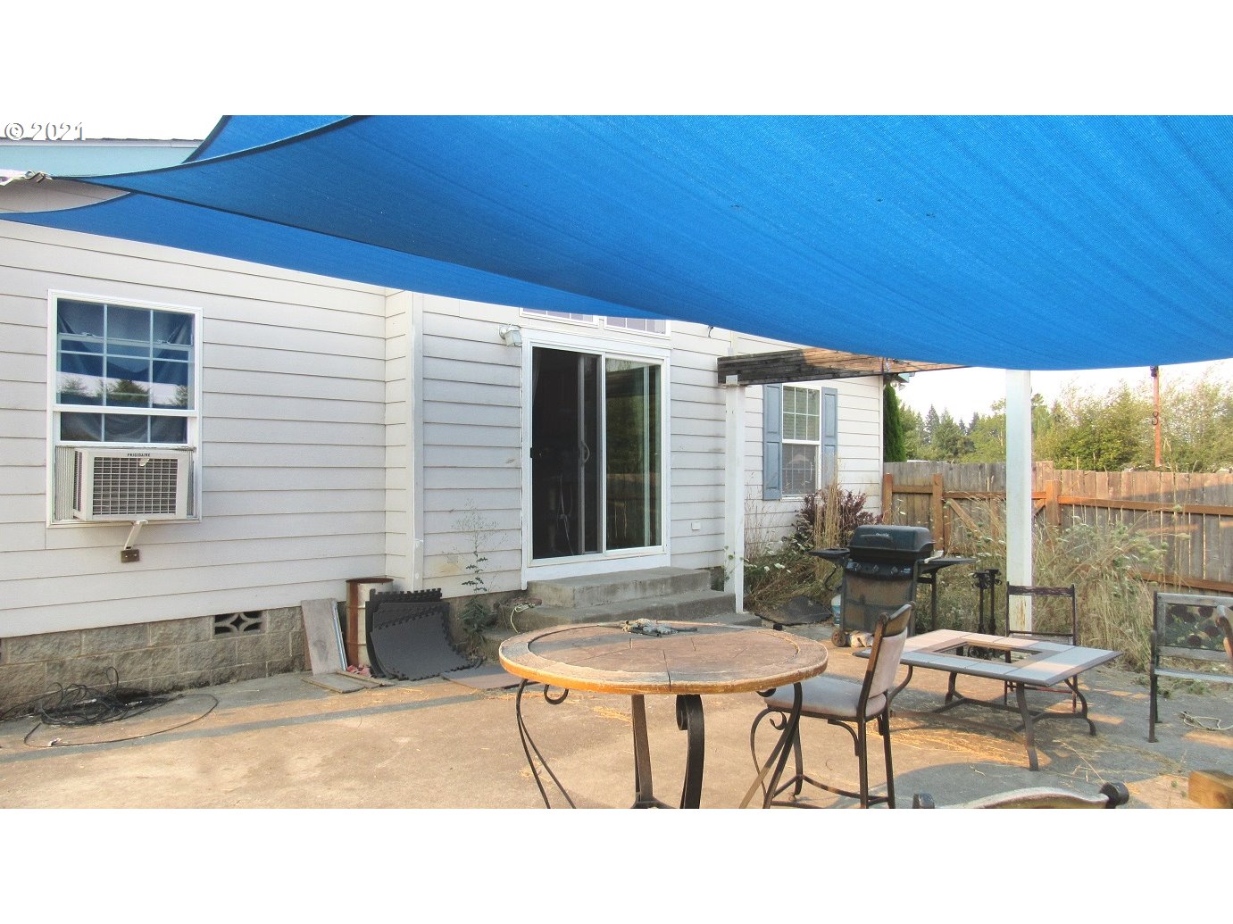 480 Roe Road Winlock, WA 98596 - Photo 18 of 24 a outdoor sitting area with furniture and wooden floor