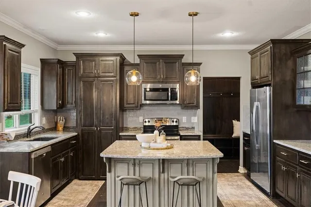 $580,000 | 1208 Becket Court, Raymore, MO 64083