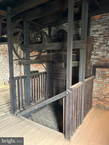 a view of an empty room with stairs