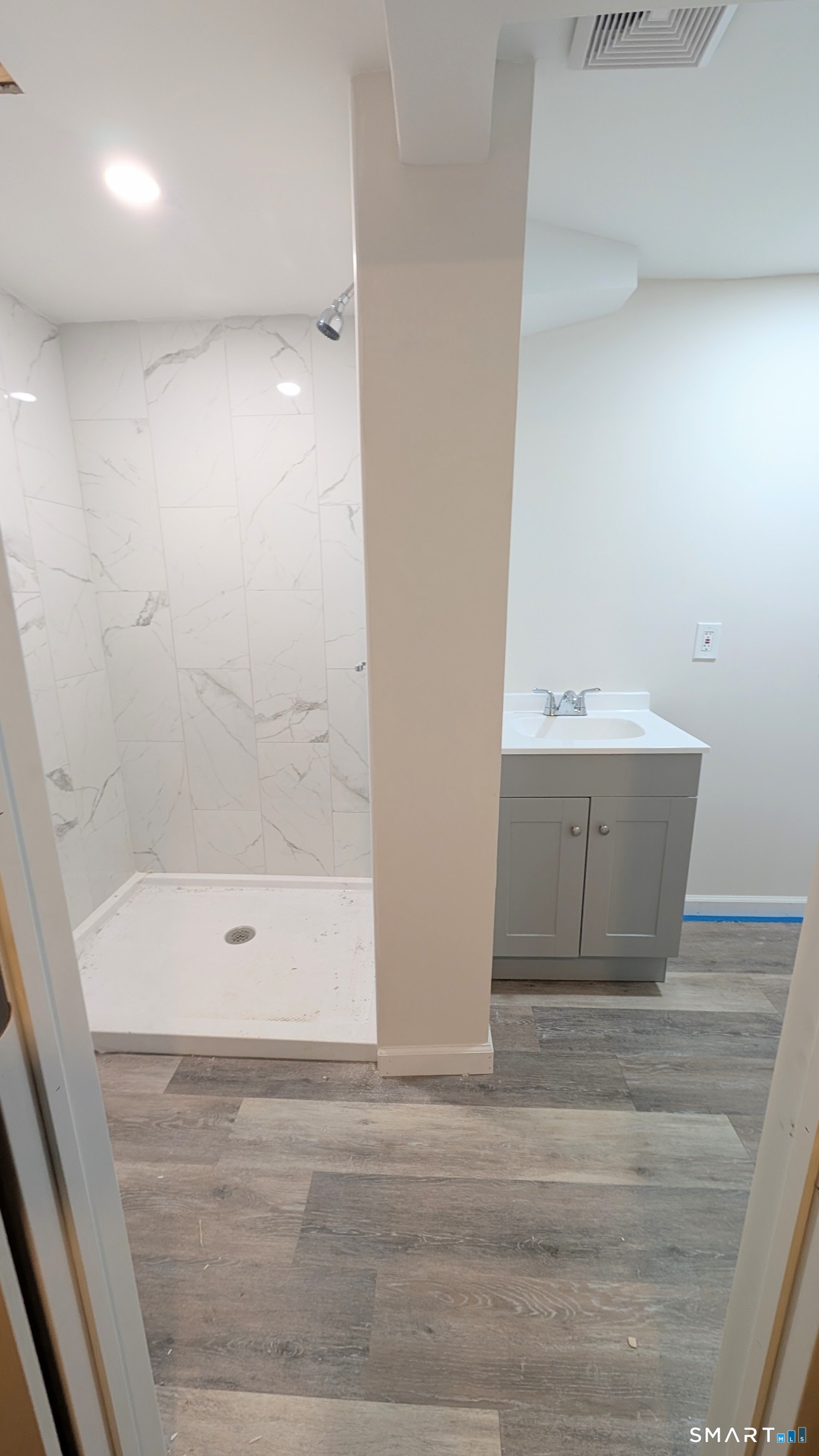 21 Rondy Lane East Hartford, CT 06108 - Photo 25 of 28 Downstairs bathroom and laundry