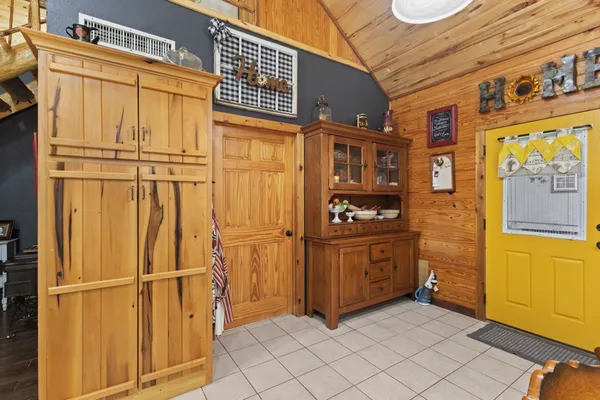 a kitchen with stainless steel appliances granite countertop a refrigerator and a stove