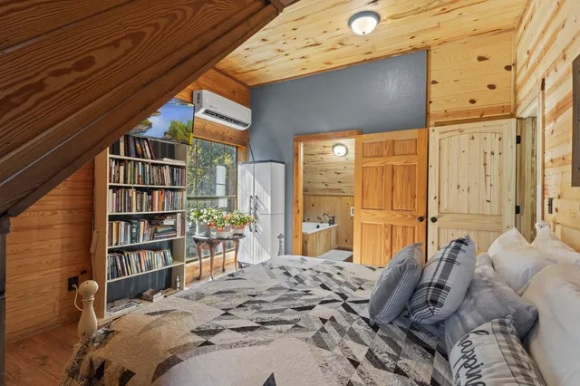 a bathroom with a sink toilet and mirror