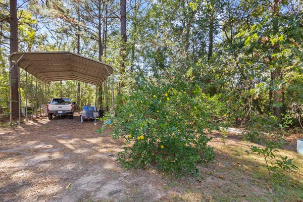 a view of a back yard of the house