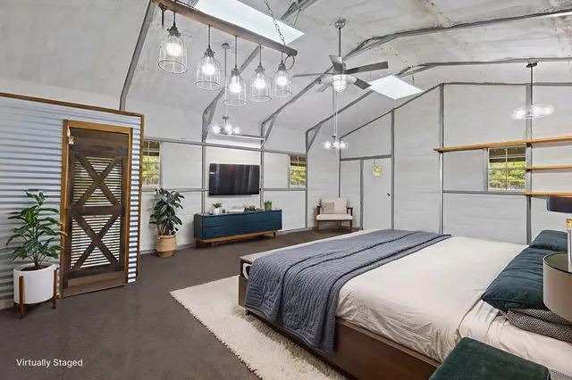 a view of a field with an ocean beach