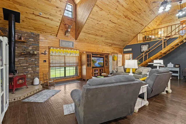 a bed room with furniture and a window