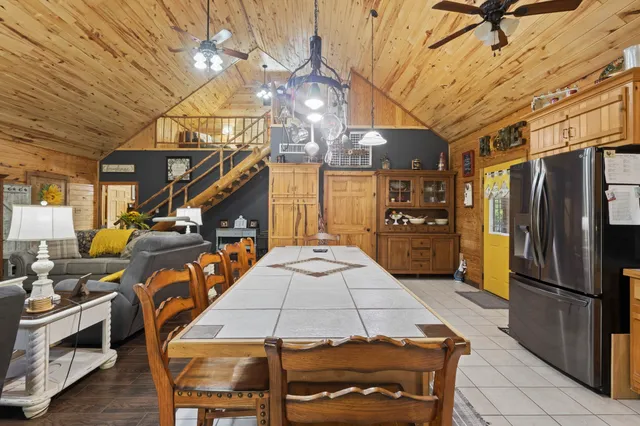 a outdoor space with lots of chairs and mirrors